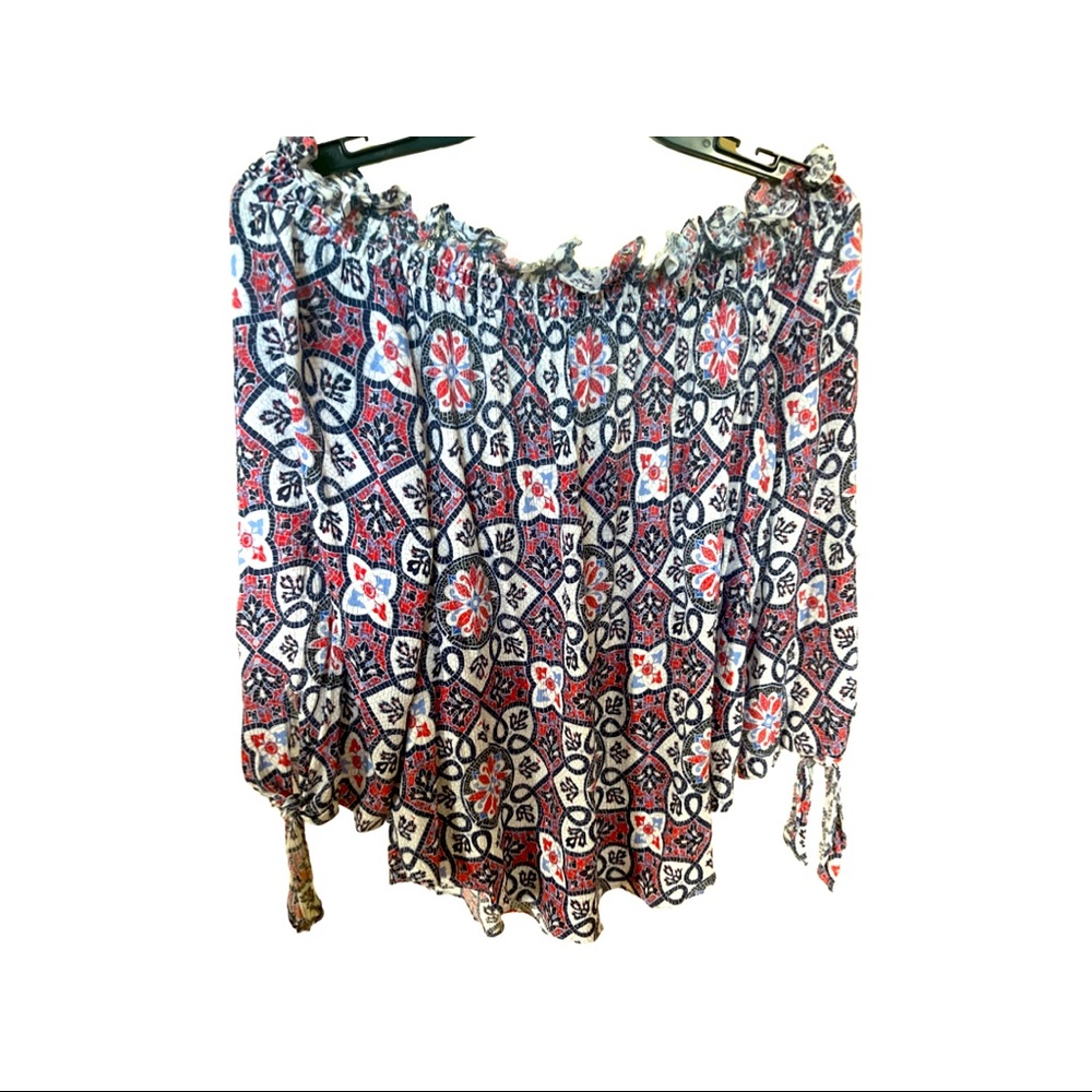 Easy to pair it with blue or white jeans. Elastic shoulder line.Polyester